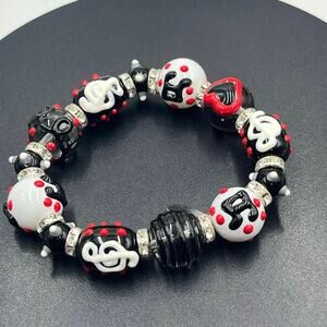 *Katie and May Red‎ And Black Glass Musical Beads Stretch Bracelet